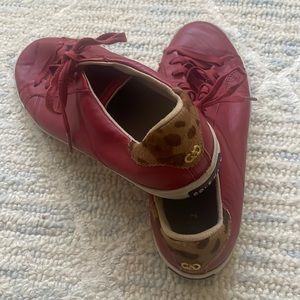 Cole Haan red leather sneakers with leopard detail